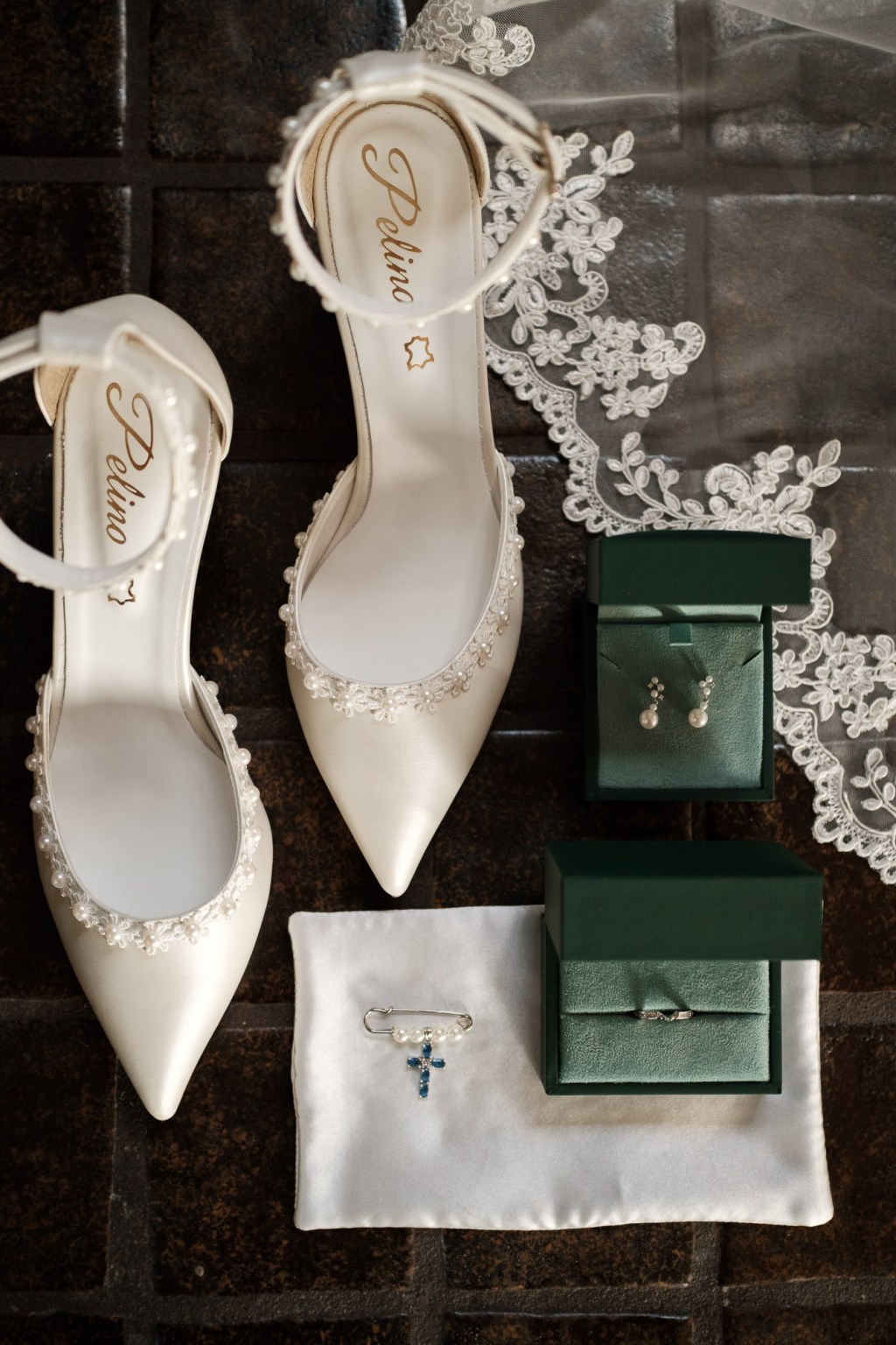 Bride’s wedding accessories styled on ceramic tile inside a mid-century Airbnb during Mount Rainier elopement