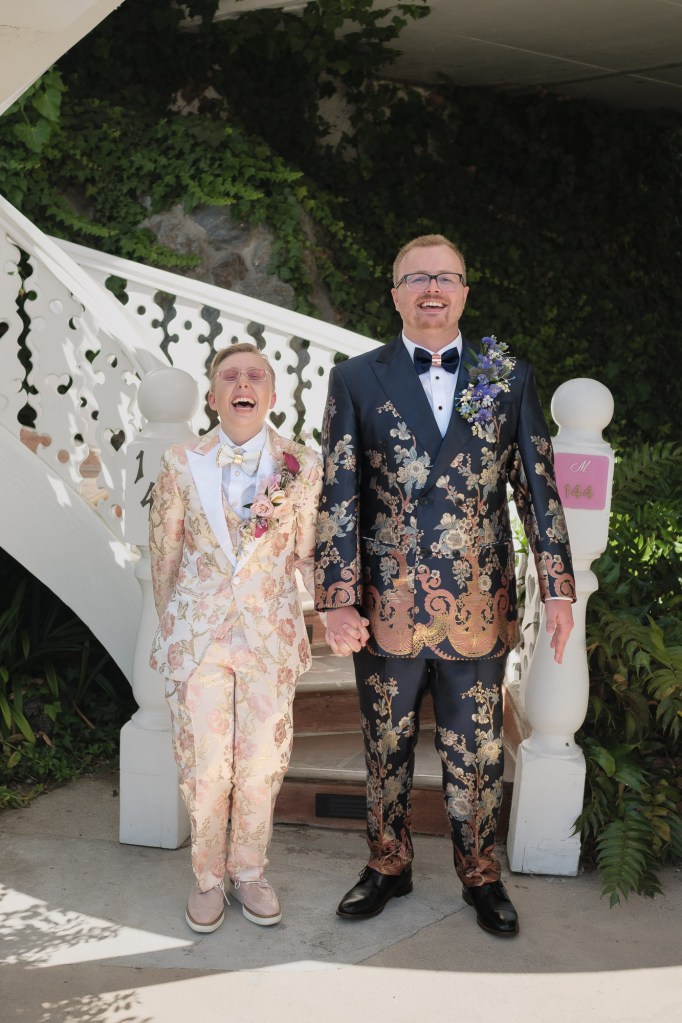 Vaughn and Sam portrait at Madonna Inn spiral staircase photographed using Fuji X-T5 and Viltrox 25mm f1.7 AIR during wedding session.