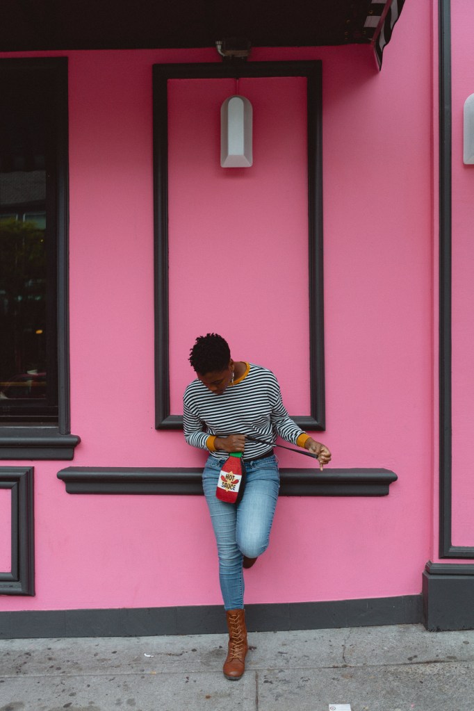 Candid photo of woman walking through Vancouver city streets photographed with Sony 28mm f2.