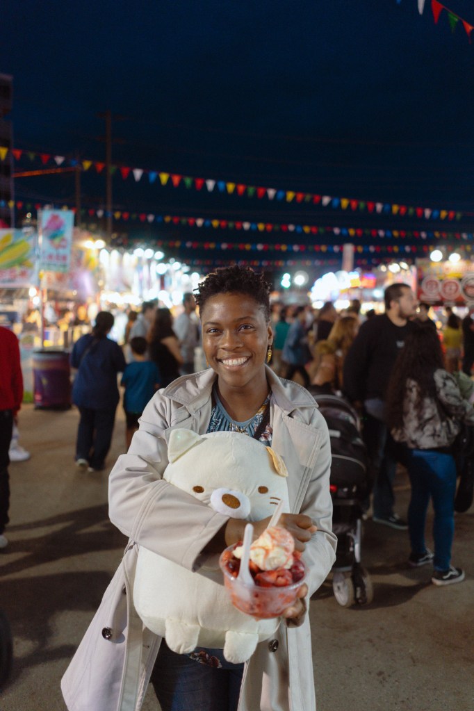 Night portrait of woman using the Sony A7.
