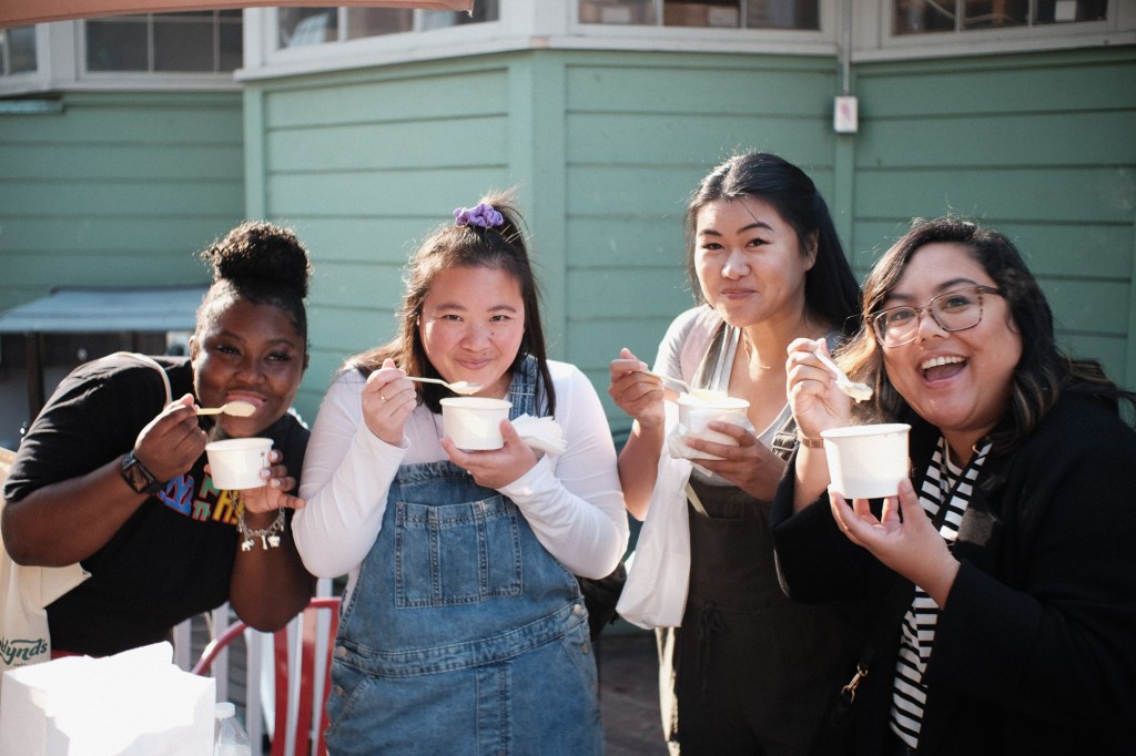 Street style portrait in Seattle market using Fuji X-E2 and manual focus lens.
