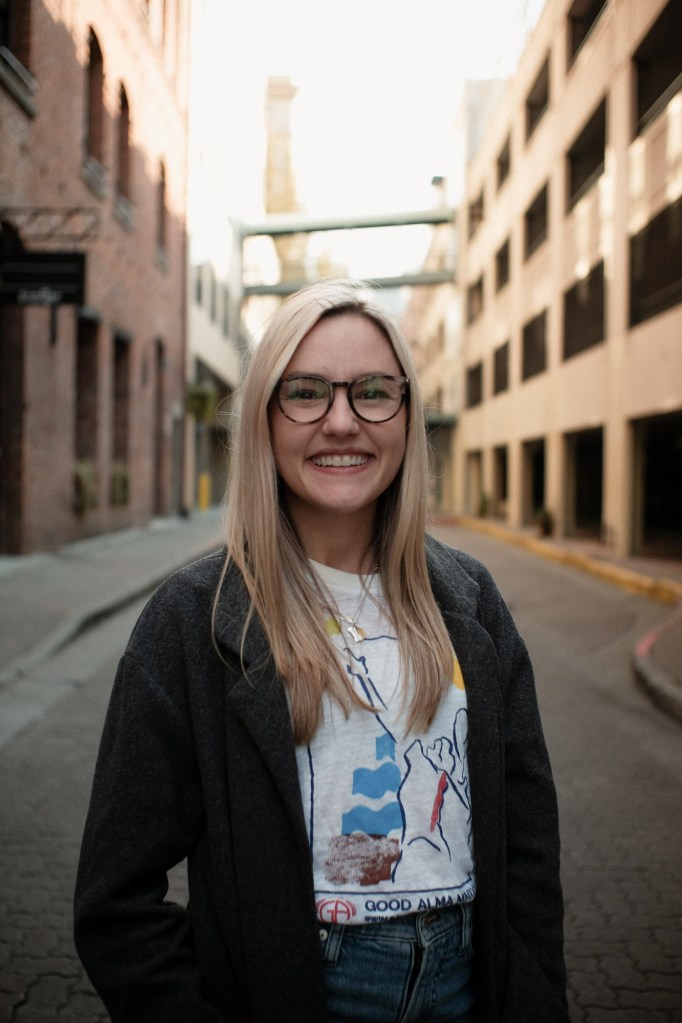 Environmental portrait in Seattle alley captured with Fuji X-E2.