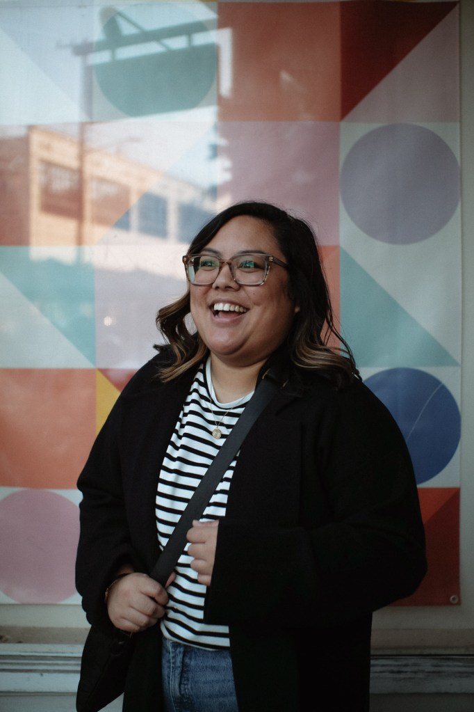 Portrait walking through Seattle streets captured with Fuji X-E2 and Meike 25mm lens.