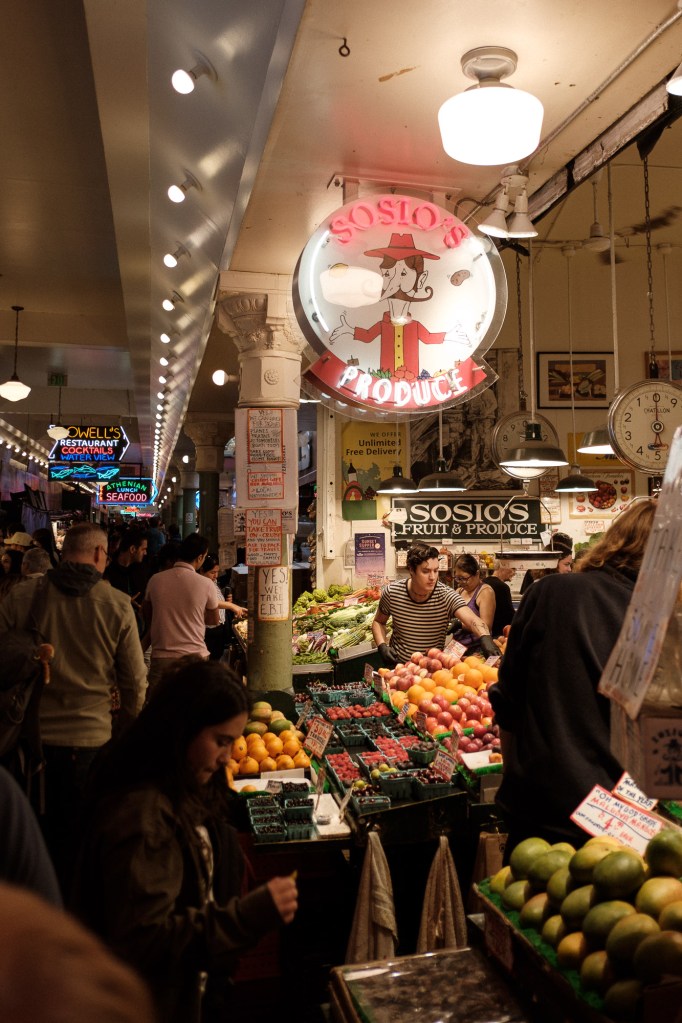 Inside Pike Place Market with vendors and shoppers captured on Fuji XF 18mm f2