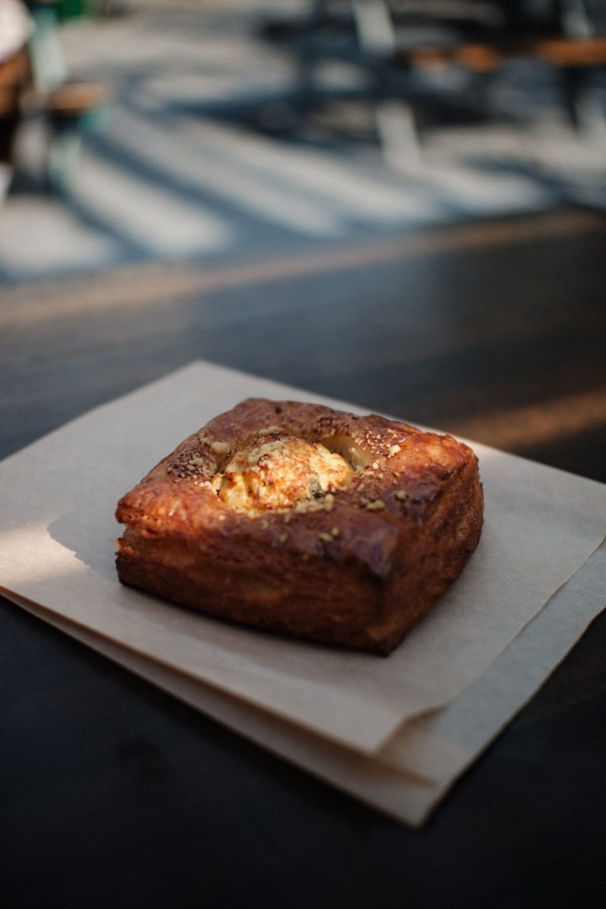 resh pastry displayed at Sea Wolf Bakers in Seattle with natural light highlighting texture and detail.